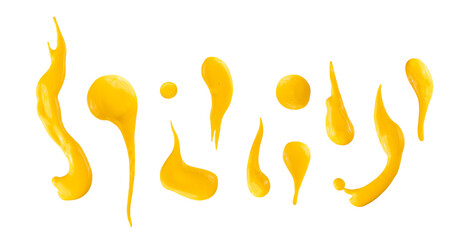 Set of yellow drops and splashes of cheese sauce or mustard isolated on white background. With clipping path. Full depth of field. Focus stacking. PNG