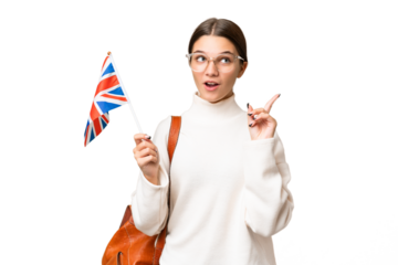 Teenager student caucasian girl holding an United Kingdom flag over isolated background thinking an idea pointing the finger up