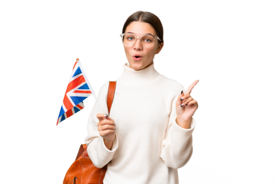 Teenager student caucasian girl holding an United Kingdom flag over isolated background intending to realizes the solution while lifting a finger up