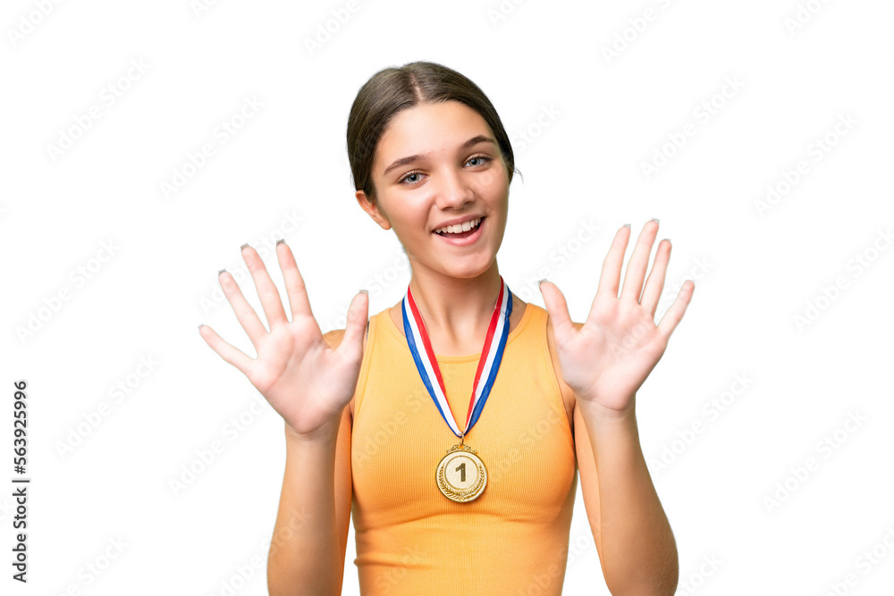 Poster Teenager caucasian girl with medals over isolated background counting ten with fingers