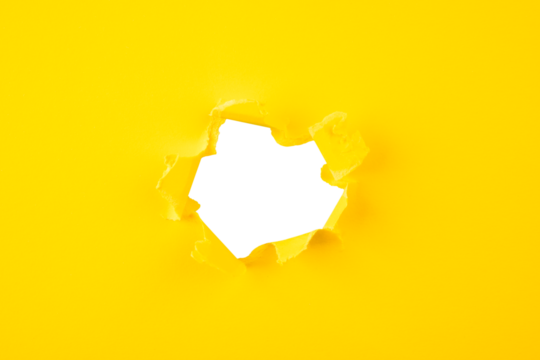 yellow Hole paper with torn sides.