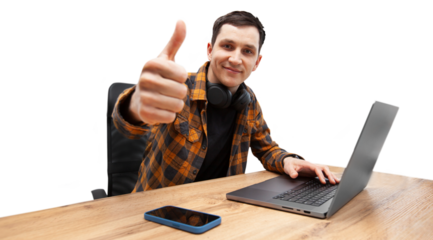 Employee IT specialist sit at work with laptop and  show thumb up gesture on a transparent background