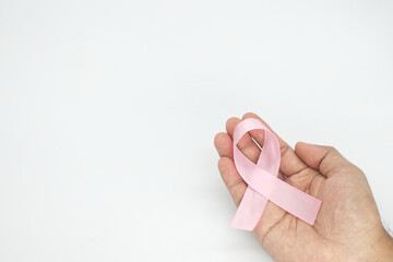 hand hold pink ribbon  on white background