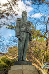 Fototapeta premium Shimane Japan 2nd Dec 2022: the statue of Senge Takatomi in shrine Izumo-taisha. He is is a Japanese Shinto politician and religious figure.