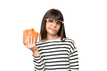 Little girl holding fried chips over isolated chroma key background with sad expression