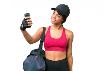 Young sport African american woman with sport bag over isolated background making a selfie