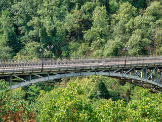 Pedestrian metal bridge over Yantra river in Veliko Tarnovo, Bulgaria. Stambolov Bridge