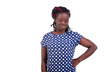 Young woman standing hand to hip.