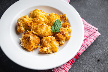 cauliflower with cheese baked vegetables healthy meal food snack on the table copy space food background rustic top view keto or paleo diet veggie vegan or vegetarian food