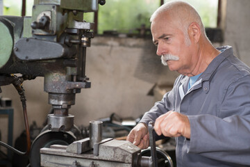 portrait of milling-machine senior operator