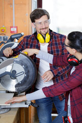 woman is ready to working on circular saw