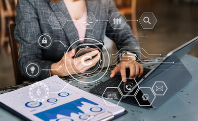 Copyright or patent concept, Person hand using laptop computer, tablet and smartphone with virtual screen copyright icon trademark, Creation ownership against piracy. at office.