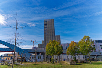 Fototapeta na wymiar Art school building at industrial district of City of Zürich on a blue cloudy winter day. Photo taken January 2nd, 2023, Zurich, Switzerland.