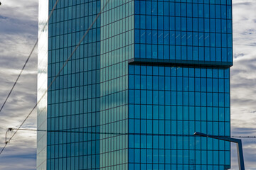 Skyscraper Prime Tower at City of Zürich on a blue cloudy winter day. Photo taken January 2nd, 2023, Zurich, Switzerland.