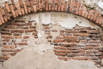 old brick wall with hole