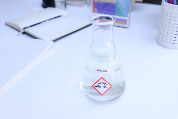 nitric  acid in glass, chemical in the laboratory