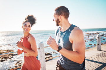 Running, fitness and sea with a sports couple outdoor during summer for cardio or endurance...