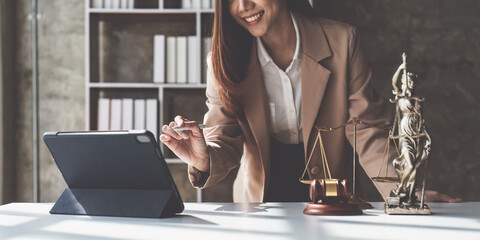Lawyer working at office. Asian Lawyer doing with contract or document in office. Law, legal...