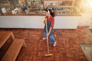 Music, dance and woman cleaning cafe, coffee shop restaurant or bakery for fun, stress relief or...