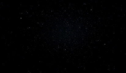 Stars in the night sky at clear weather in the spring season. Black sky with stars.