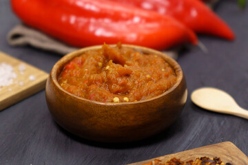 Balkan sauce ajvar and ingredients for its preparation. Serbian traditional food.