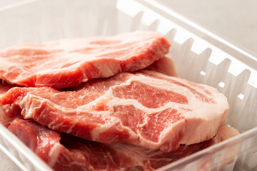 Fototapeta premium Fresh neck meat in packaging container 