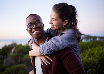 Love, nature and interracial couple piggyback on mountain adventure for holiday, vacation and...