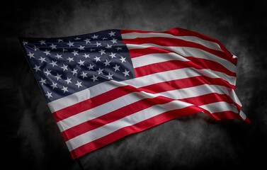 Obraz premium American flag on dark background. USA flag on a black background.