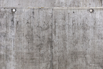 Weathered concrete wall with technological wholes - dot pattern