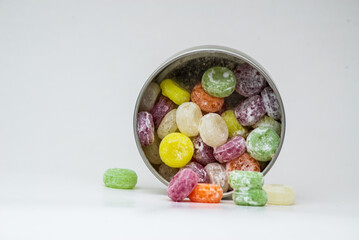 colorful sweet flavoured boiled sweets, candies, Candy on white, black background, hard candy.