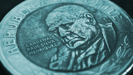 Coin of 500 Chilean pesos сlose-up. Peso of Chile. News about economy or banking. Loan and credit. Wages and money. Turquoise tinted wallpaper or background. Macro - obrazy, fototapety, plakaty