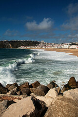 Fototapeta na wymiar Nazaré Beach, fishing village on the Atlantic coast of Portugal