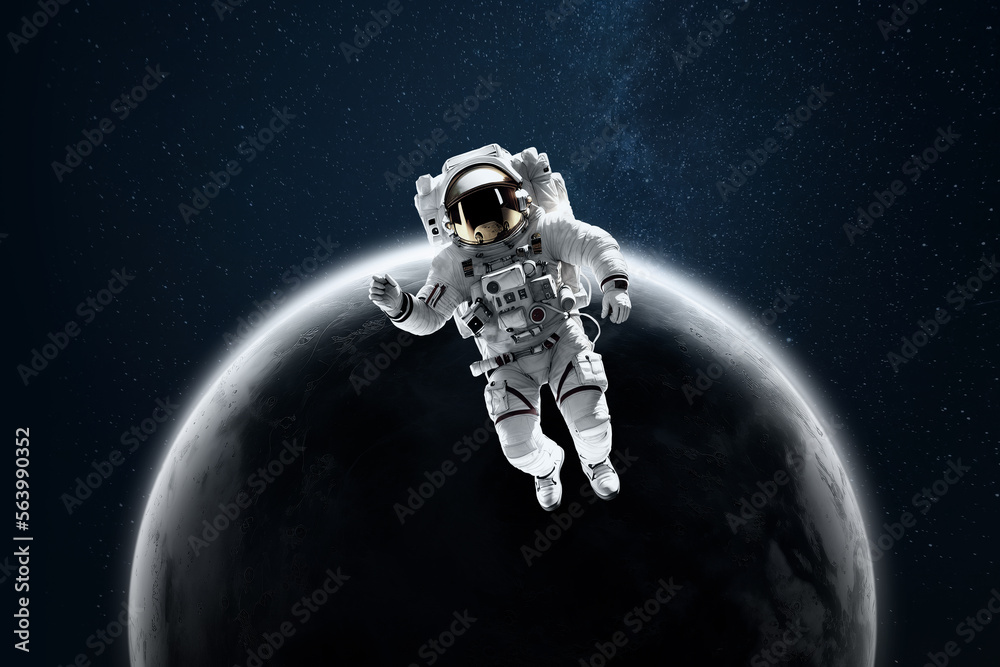 Wall mural astronaut in a white spacesuit in space on the background of the moon. exploring space and other pla