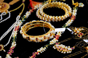Indian Traditional jewellery displayed in a street shop for sale in Pune, Maharashtra. Indian art,...