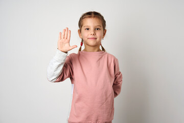 Child saying stop with a hand, white background