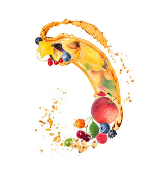 Various berries and fruits in splashes of juice in the air on a white background