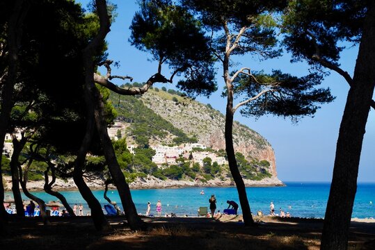 People swimming and relaxing at Calla Agulla. Majorca, Spain.