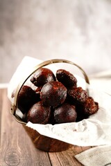 Unniyappam or Unni appam - Traditional kerala snack with rice dry coconut jaggery fried in ghee , selective focus