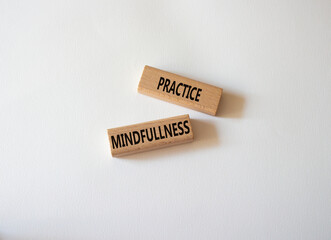 Practice Mindfullness symbol. Concept words Practice Mindfullness on wooden blocks. Beautiful white background. Medical and Psychology and Practice Mindfullness concept. Copy space.