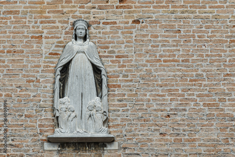 Canvas Prints religious bas-relief on the façade of the scoletta dei calegheri, historical seat of venetian shoema