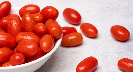 Grape tomatoes on white background	