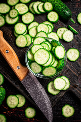 Cucumbers cut on a cutting board. 