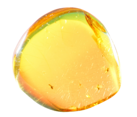 closeup of a piece of amber on a transparent background and reflection