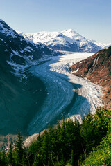 View of Salmon Glacier flowing between Boundary Ranges near Stewart, British Columbia and Hyder, Alaska - 564007937