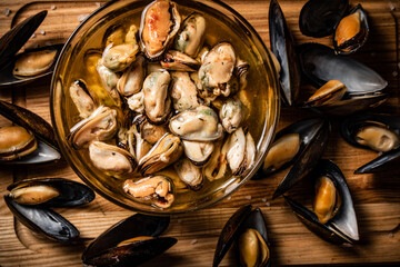 Pickled mussels in a glass bowl. 