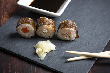 typical japanese sushi with soy sauce and chopsticks