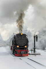 Fototapeta na wymiar Steam locomotive ready to go to the Brocken in winter, Germany