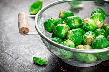 Brussels sprouts in a colander. 