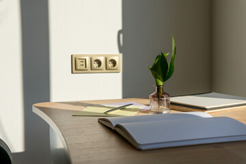 study. notepads on a wooden table with a beautiful color. composition of work and learning.