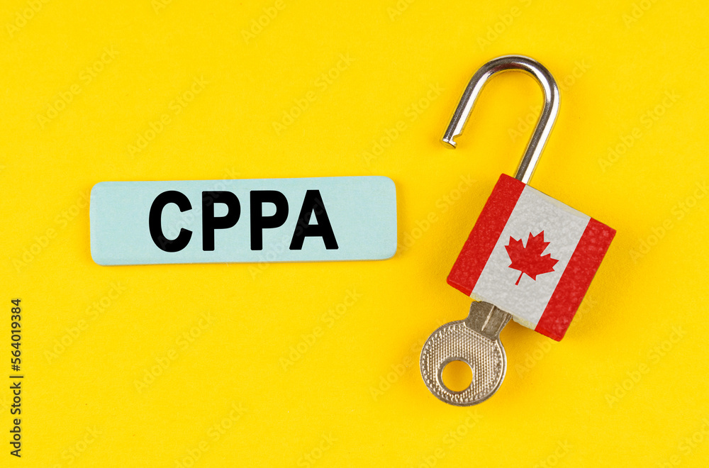 Poster On the yellow surface is an open lock with a key and a sticker with the inscription - CPPA